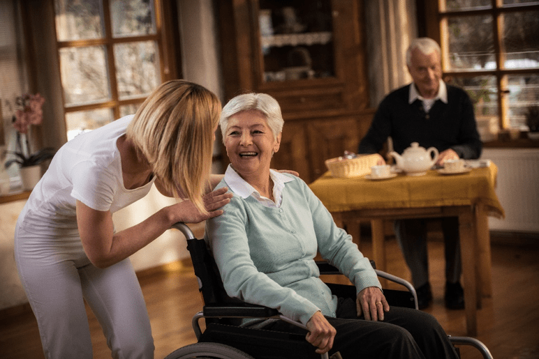 Caregiver helping a woman